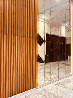 a building with a wooden wall and a window at Modern Comfort with Moroccan Soul in Casablanca