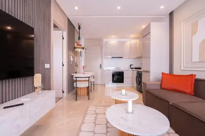 a living room with a couch and a table at Premium Stay - Lux Housing Bourgogne in Casablanca