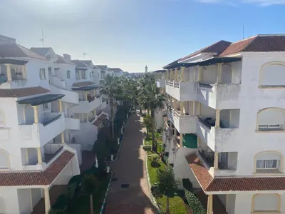 an aerial view of an alley between buildings at Appartement balnéaire équipé in Sidi Rahal