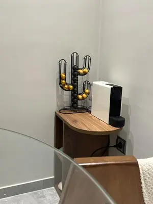 a glass table with a display of equipment on it at Appartement à Casablanca Ferme bretonne OCP à 5min du CFC in Casablanca