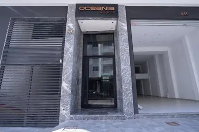 an entrance to a building with a revolving door at Premium Stay - Promenade Hassan II in Casablanca