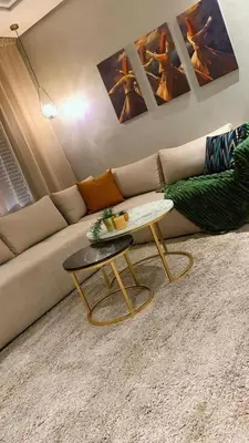 a living room with a couch and a coffee table at Cosy C35 in Casablanca