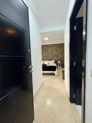 a room with a door leading to a bedroom at Oumadane Appart-Ocean view- Amazing apartment-International Fair and more near by in Casablanca