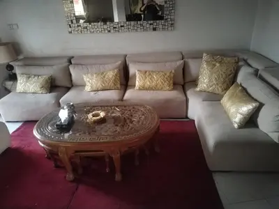 a living room with a couch and a coffee table at Sense house 2 in Rabat