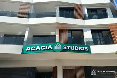 a building with aania studios sign on the side of it at Acacia Studio 02 in Casablanca