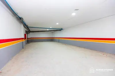 an empty room with red yellow and white walls at Acacia Studio 04 in Casablanca