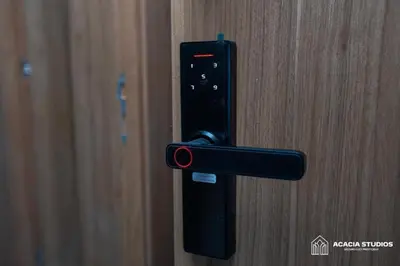a black door handle on a wooden door at Acacia Studio 15 in Casablanca