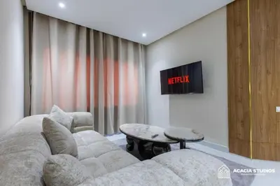 a living room with a couch and a table at Acacia Studio 15 in Casablanca