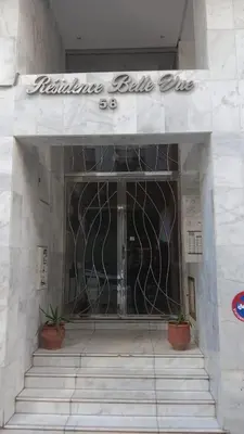 a entrance to a building with a sign on it at Downtown delight studio in Casablanca
