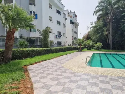 a swimming pool in front of a building at Bayt El Fath in Casablanca