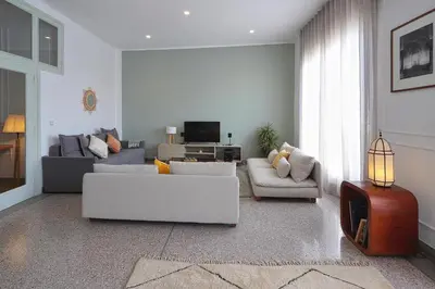 a living room with two couches and a tv at The 31 Grand Théâtre by IB Signature - Boho Chic 1BR Apt - with Wifi - Self check-in - 24 x7 Security - City View with terrace - Walk to Cafes! City Centre, Tram in Casablanca