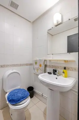 a bathroom with a toilet and a sink at Appartement Agdal, proche des stades in Rabat
