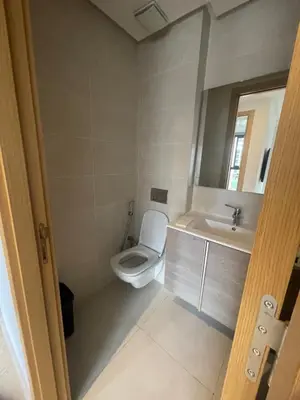 a bathroom with a toilet and a sink at Studio moderne et élégant Idéal pour un séjour confortable in Rabat