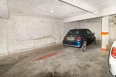 a small car parked in a parking garage at Modern hideaway in Casablanca in Casablanca