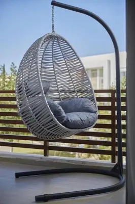 a hammock swing with a teddy bear in it at Family-Friendly 3BR with Garden and Outdoor Space in Bouskoura
