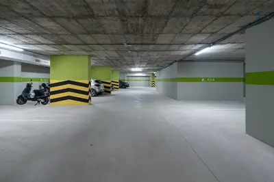 an empty parking garage with motorcycles parked in it at Luxurious studio with view gym parking and keyless access in Casablanca