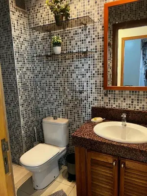 a bathroom with a toilet and a sink at Zen Haven - by Nero in Casablanca