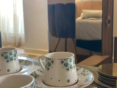 two cups and saucers on a table in a room at Welcome to Casablanca in Casablanca
