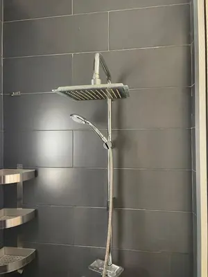 a shower with a shower head in a bathroom at appartement Gautier in Casablanca