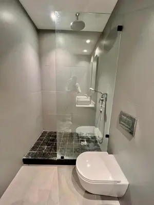 a bathroom with a toilet and a sink at Chadox immobilier in Casablanca