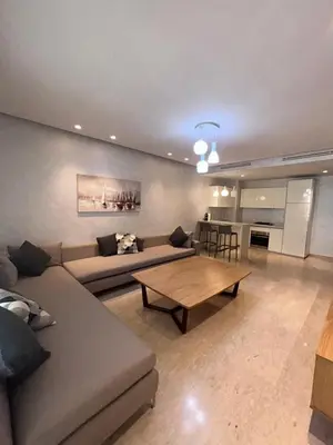 a living room with a couch and a coffee table at Anfa Casablanca in Casablanca