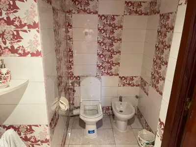 a small bathroom with a toilet and a sink at Dar dyafa in Casablanca