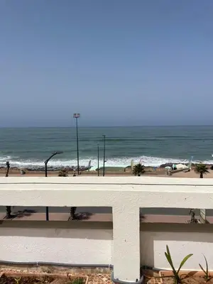 a view of a beach with the ocean in the background at Chambres Surf,Piano et Arts in Tamaris