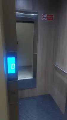 a bathroom with a blue light in a train at La passage inoubliable F in Bouznika