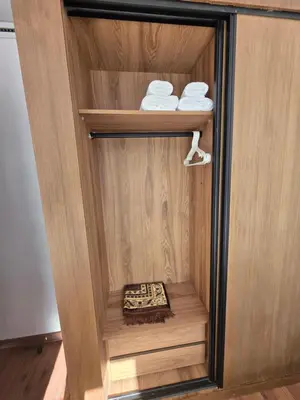 a closet with two folded towels and towels at Résidence EDEN 4 - Casablanca Center in Casablanca