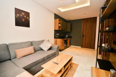 a living room with a couch and a coffee table at Atelier Aedes - Studio 2 in Maarif