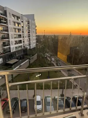 a view of a parking lot with cars parked at Nice Studio rabat in Rabat