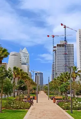 a walkway in a city with tall buildings at Appartement CFC vue sur mer et sur la ville in Anfa