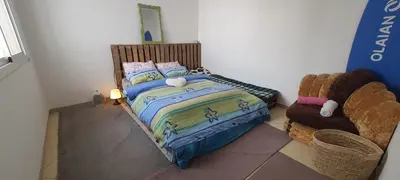 a bedroom with a bed with a disney bedspread at Appartement situated 10 min from city center in Settat