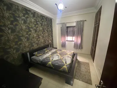 a small bedroom with a bed in a room at casablanca,bourgogne,corniche in Casablanca