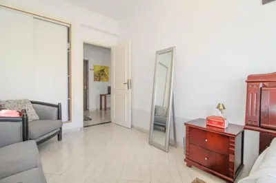 a living room with a mirror and a dresser at Studio Panoramique, Mosquée Hassan II, Cœur de la Médina in Casablanca