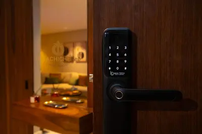 a remote control on a door with a room at Butterfly 703 Harve de paix au Cœur de Casablanca in Casablanca
