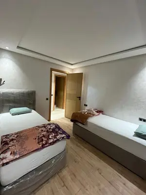 a bedroom with two beds in a room at Zahira New Luxury Near The Beach - Entire Apartment in Casablanca
