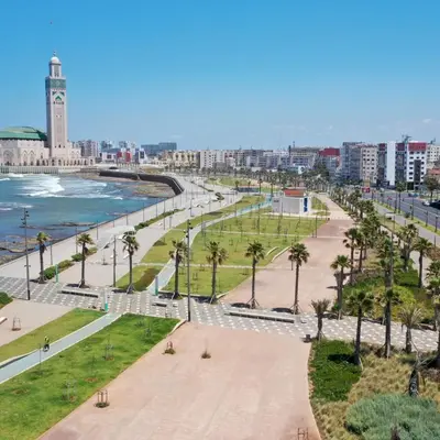 a view of a city with a clock tower at Ain Diab Sunrise Nest & Parking in Casablanca