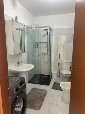 a bathroom with a shower and a sink and a toilet at Signorina appartamento in Temara