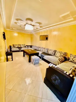 a large living room with couches and a table at familly house in Tamaris