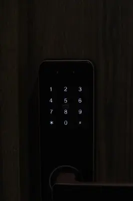 a close up of a remote control in the dark at Charmant studio au cœur de Maarif - Confort balcon et emplacement idéal in Casablanca