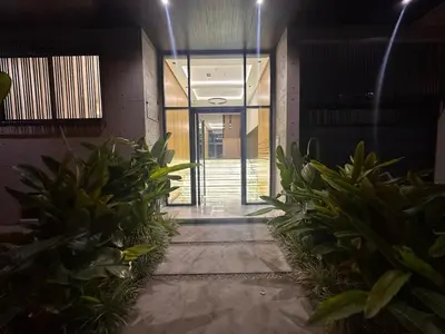 an empty hallway with plants in a building at Comfortable & Central Casablanca Apartment in Casablanca