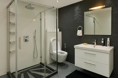 a bathroom with a toilet and a glass shower at Rooftop in Maarif