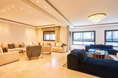 a large living room with couches and a table at Casablanca 3 Bed Unit in Triangle Dor With Parking in Casablanca