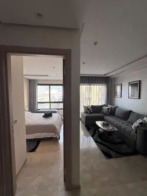 a living room with a couch and a bed at Nova Casa in Casablanca