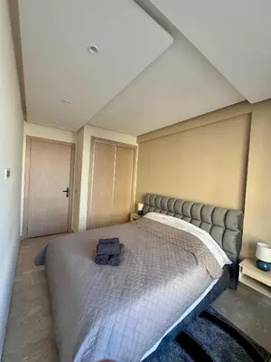 a bedroom with a large bed in a room at Nova Casa in Casablanca