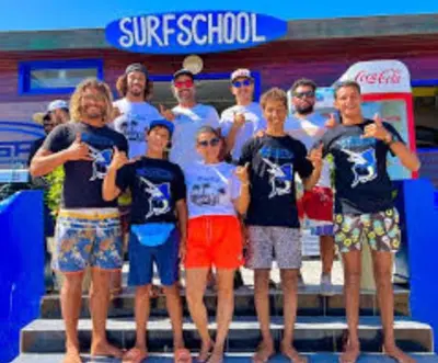 a group of people posing for a picture at Apartment 1 CH près de la plage in Oulad Akkou