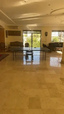 a large room with a ping pong table in it at Villa à louer nouaceur 3 chambres in Nouaseur