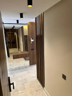 a room with a hallway with a mirror and a door at Harmonie Elitaire in Casablanca