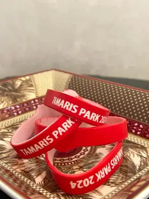 a pair of redbands with the words mardi gras park at Appartement cosy et confortable in Casablanca